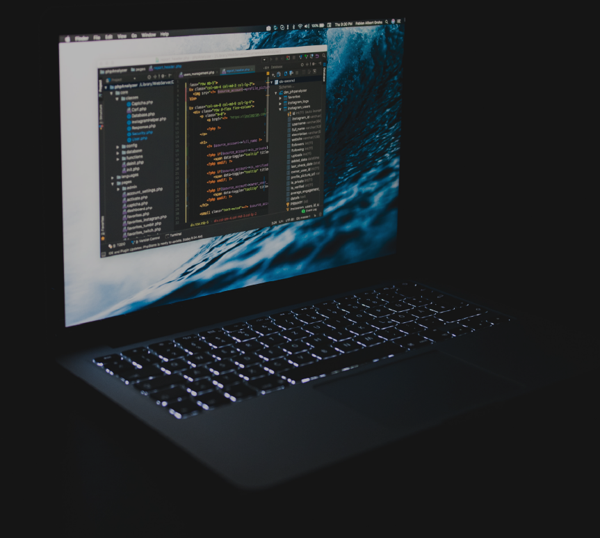 Laptop showing web development code